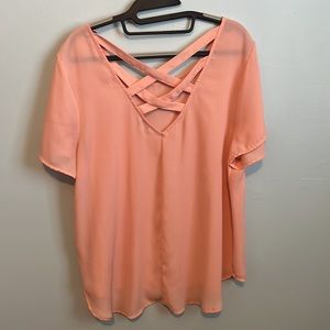 Peach blouse with crisscross back detail